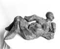 RECLINING WOMAN, Painted cement, 38cm (15in)